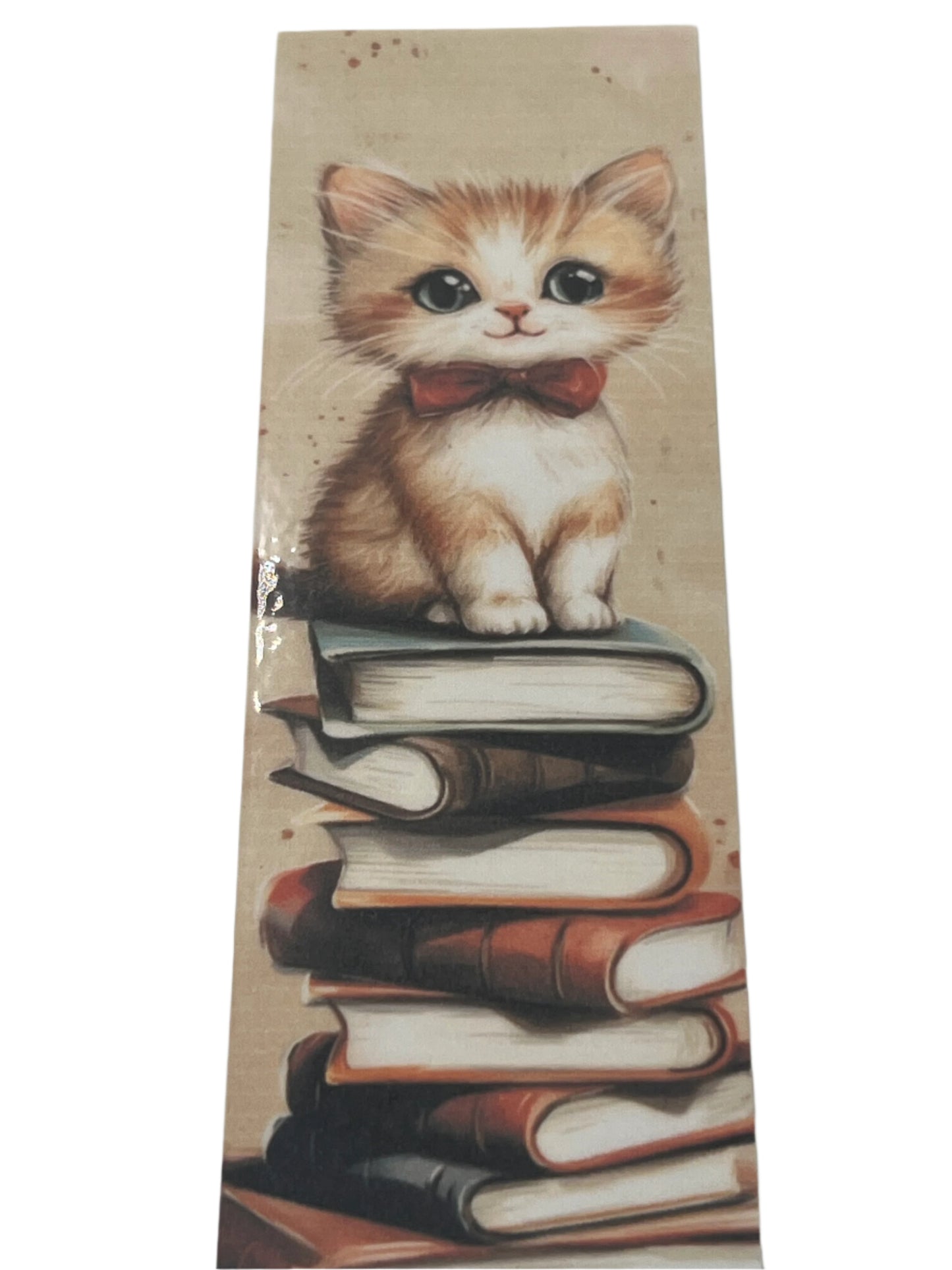 Cat with Bowtie sitting on books
