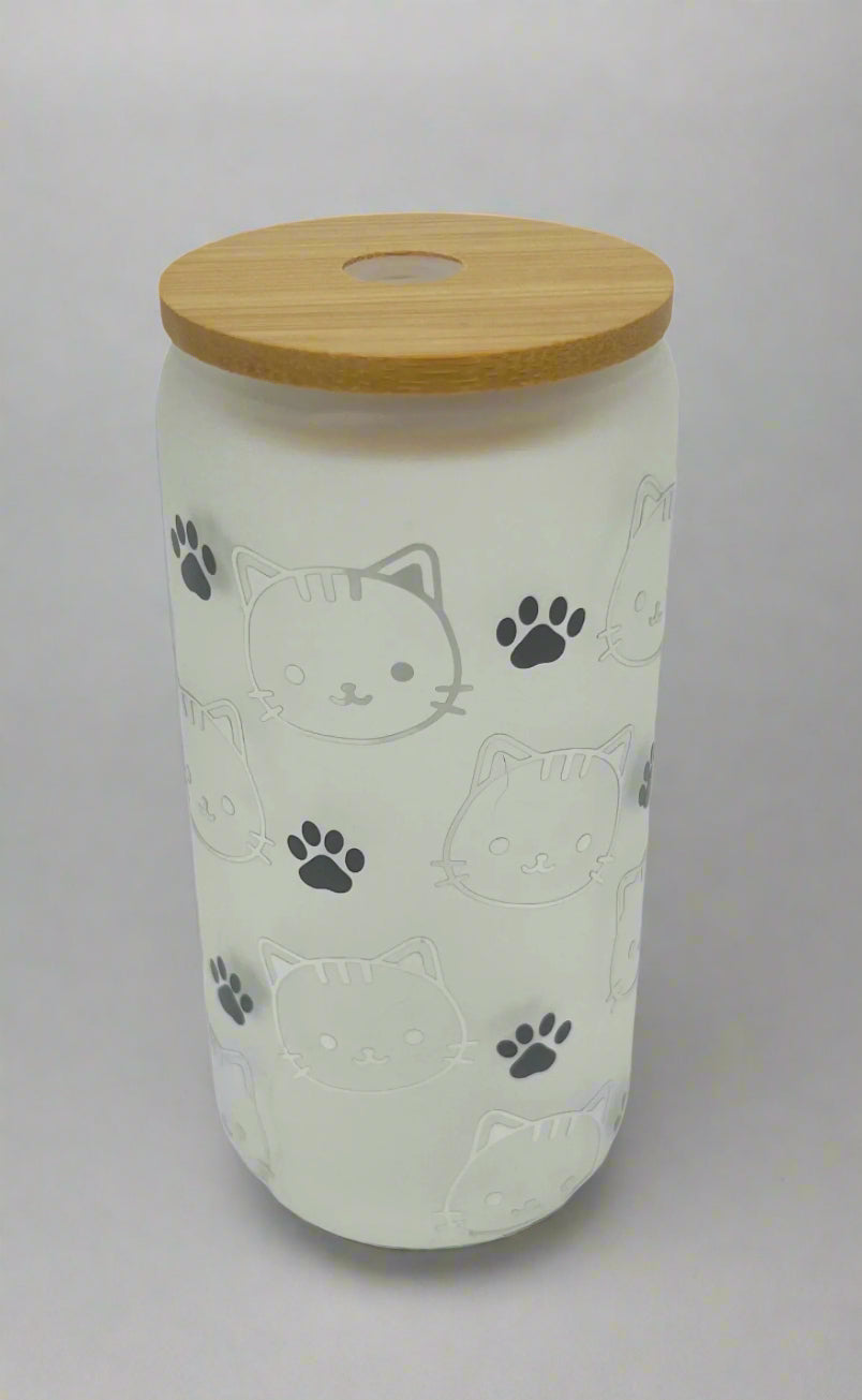 White container with cat designs and a wooden lid on a white background